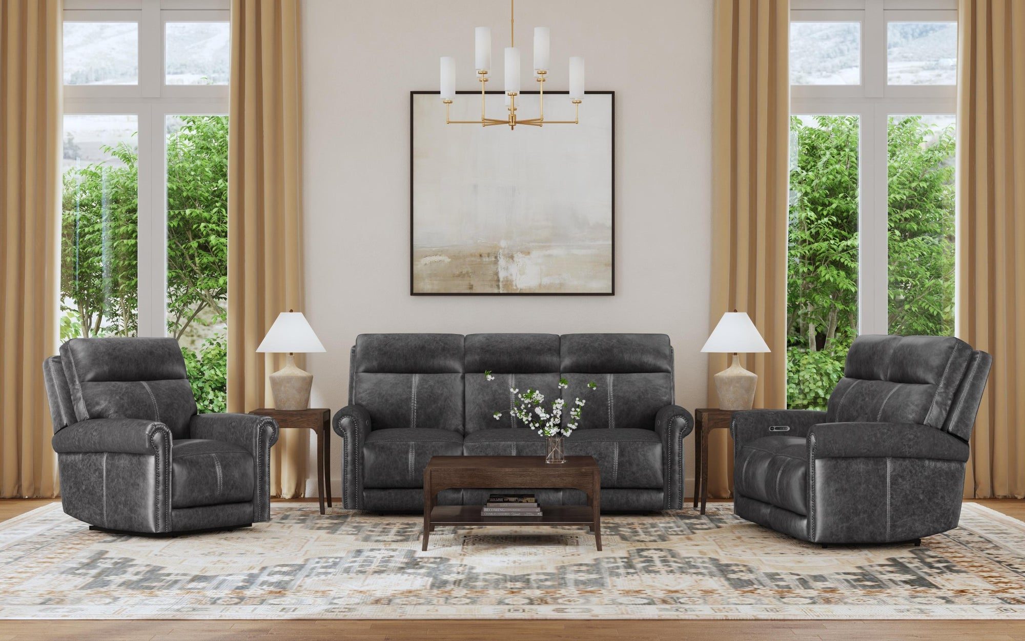 Charcoal leather power reclining sofa and two recliners between tall windows