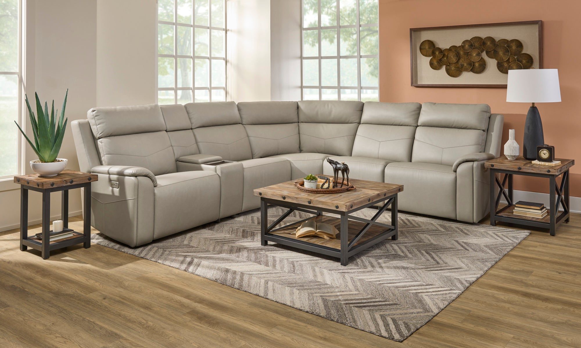 Flexsteel Vernon dove grey power reclining sectional with a rustic coffee table and end tables in a bright living room
