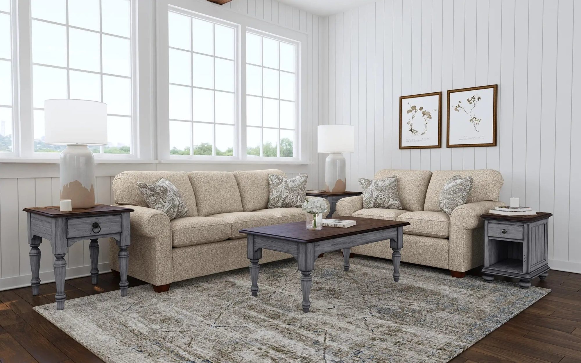 Beige sofa and loveseat with coffee and end tables